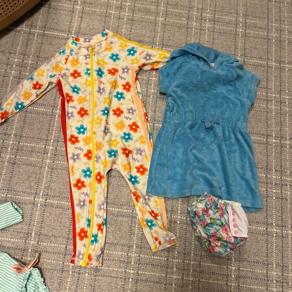 SwimZip suit and Hannah Anderson towel coverup